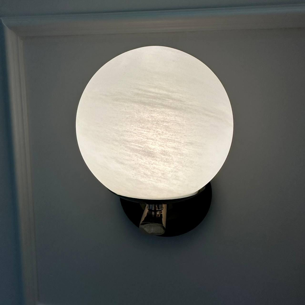 Modern Black and Brass Globe Wall Sconce, Integrated LED Wall Light for Bedroom, Hallway, Living Room, and Bedside